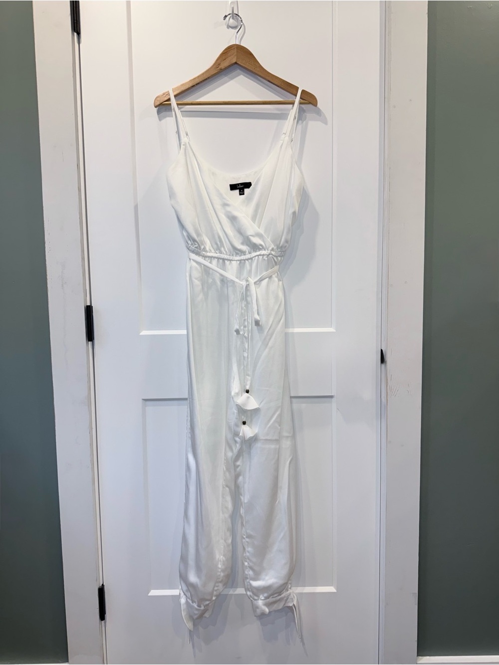 Lulu's White Sleeveless Wrap Jumpsuit with Waist Tie